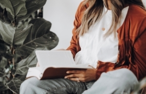 Woman reading her Bible.