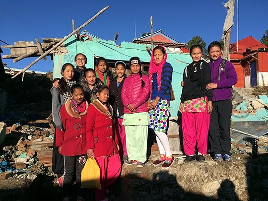 Nepali girls in front of earthquake wreckage Chitopani
