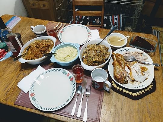 Table for two with dishes arrayed for serving