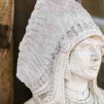 close up photo of a white statue