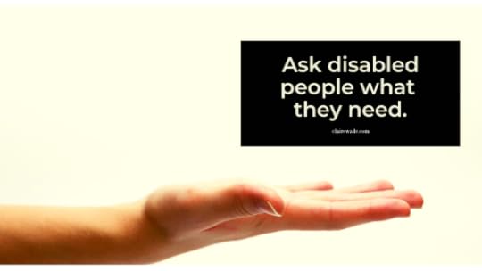 A hand outstretched with a black box and