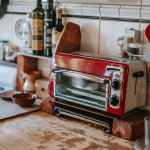 toaster oven on table in kitchen
