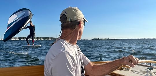 wingfoiler meets classic sailboat