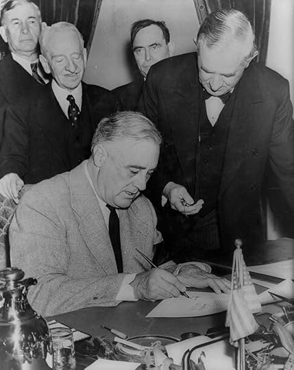 Pres. Franklin Roosevelt signing the declaration of war against Germany, 11 Dec 1941; Senator Tom Connally at right marked the time of declaration (Library of Congress: LC-USZ62-15185)