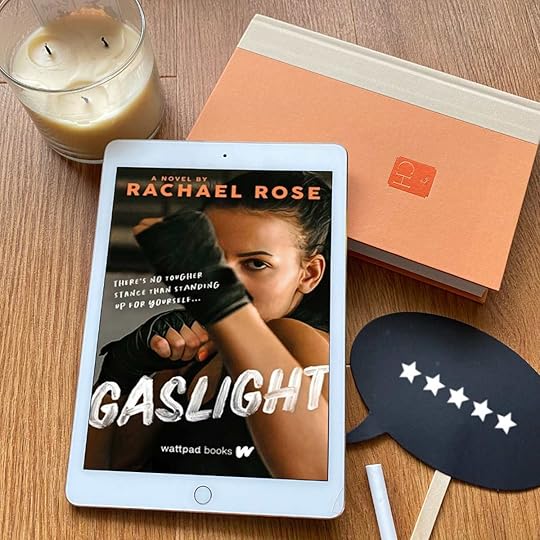 Gaslight book cover with orange book, beige candle, and a little chalkboard that says 5 stars