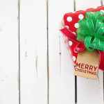 minimalist photography of a red and green christmas gift box