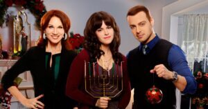 Emily Hampshire could stab you with this menorah just as easily as light it. Hitched for the Holidays, 2012 