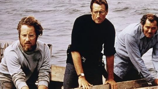 Richard Dreyfuss, Roy Scheider and Robert Shaw are seen on board a boat in a still from the film, 
