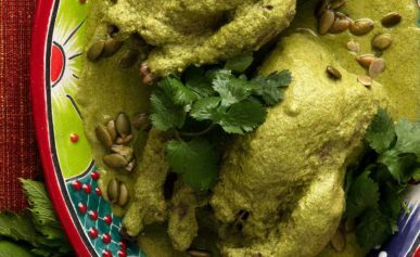 Pipian verde with partridges on a platter.