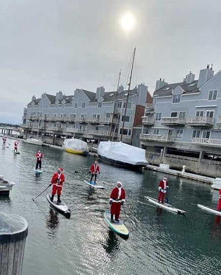 santa claus paddle board portland maine harbor