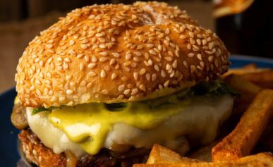 Duck burger on a plate with duck fat fries