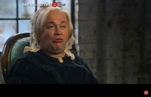 Still from the comic relief Dragon’s Den video with Harry Enfield as Deborah Meaden