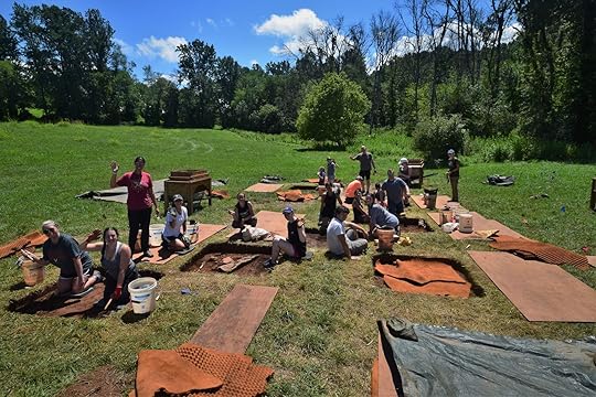 A group of people working on an archeological dig in Vermont