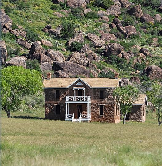 Huge boulders loom behind this officers quarters at Fort Davis Historic Site