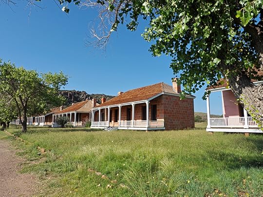 Photos of several small bungalow-style officers' quarters built in a row.