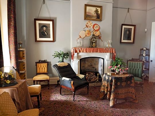 Interior photo of a furnished parlor from one of the officers' quarters.