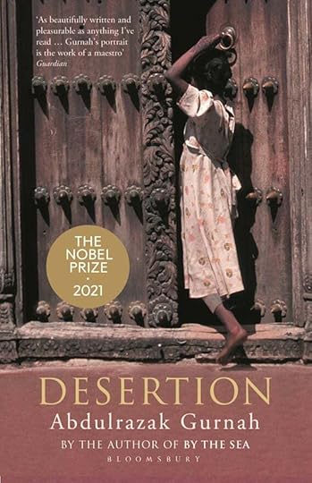 Ar putea fi o imagine cu 1 persoană şi text care spune „As beautifully written and pleasurable: anything ve read. Gurnah' portrait work of maestro Guardian THE NOBEL PRIZE 2021 DESERTION Abdulrazak Gurnah BY THE AUTHOR OF BY THE SEA BLOOMSBURY”
