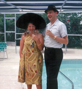 young couple by a pool in Florida