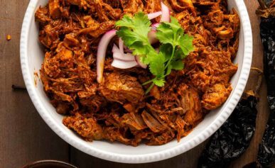 A bowl of Sinaloan chilorio with chiles and cumin.