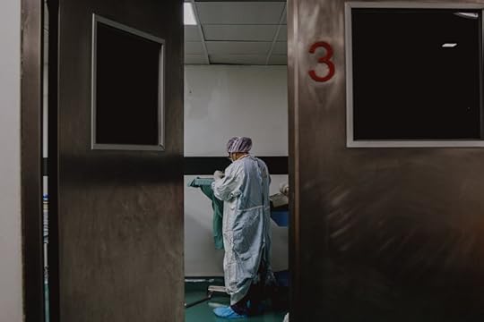 nurse in dark corridor
