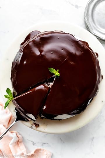 top of a ganache frosted chocolate cake