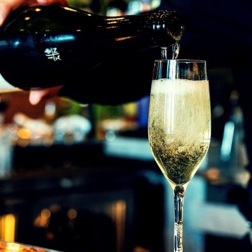pouring wine in a glass