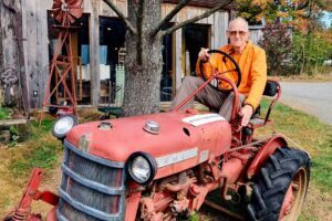 Ernest Lilley on a reitred Farmall Cub