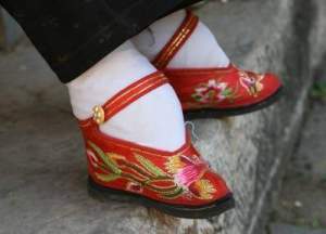 This image has an empty alt attribute; its file name is foot-binding-china-lotus-feet.jpg