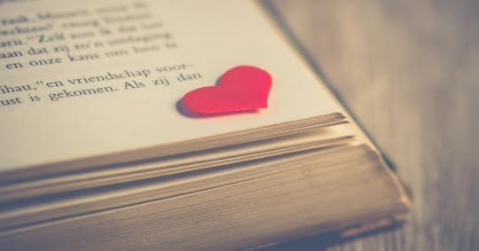 book page with red heart on it romance books