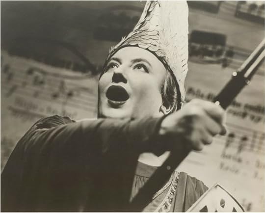 Helen Traubel, dressed as Brunnhilde, facing left, in midst of a song