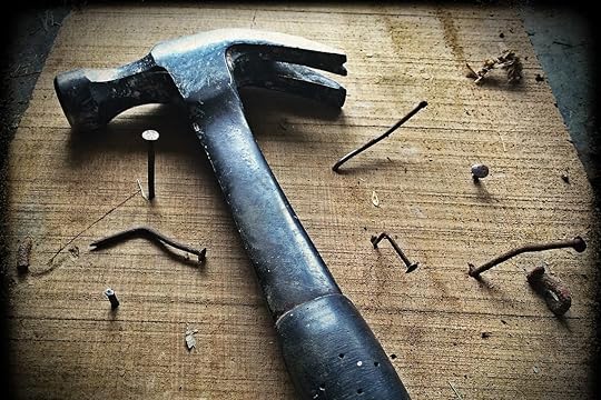 hammer and nails hard work