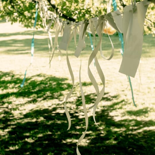 Bunting hanging in a tree for a bridal shower