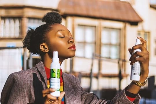 Woman spraying diy bug spray