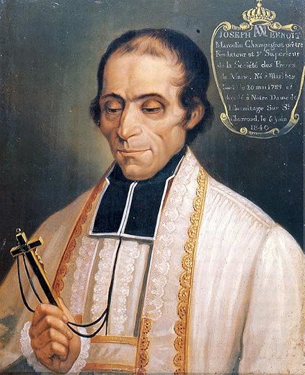 Oil painting of Catholic brother, balding with dark hair, wearing white robes and looking down at a large cross.