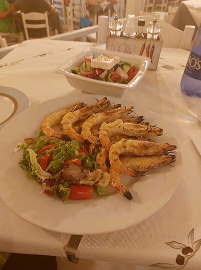 May be an image of souvlakia and indoor