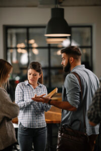 Three people arguing