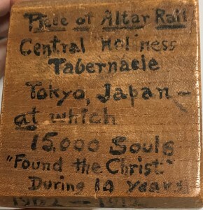 Piece of wooden altar rail noting 3000 Gospel meetings in Tokyo