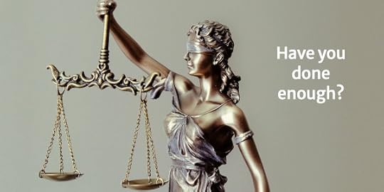 Scales of justice with text