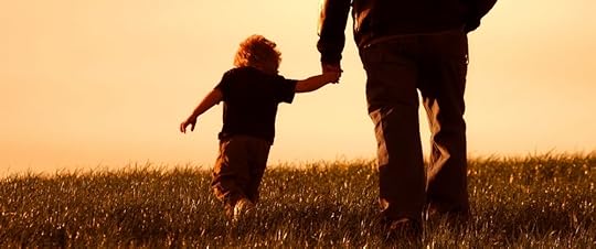 A son holding his father's hand