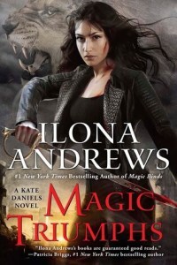 Dark-haired woman with slavic features wearing dark clothes weilds a sword. There is a lion in the background upper left of the image.
