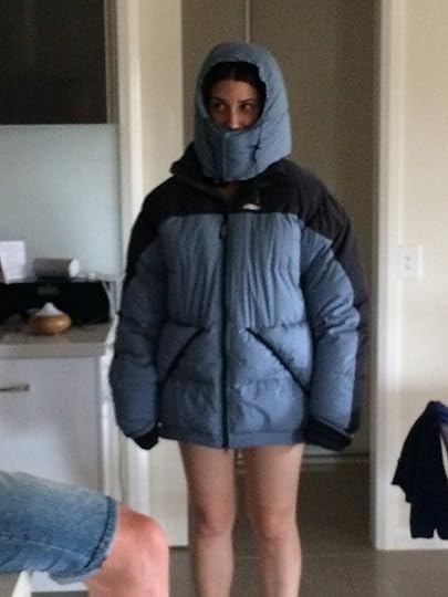 Maia ready for volunteer adventures in Nepal in oversized coat