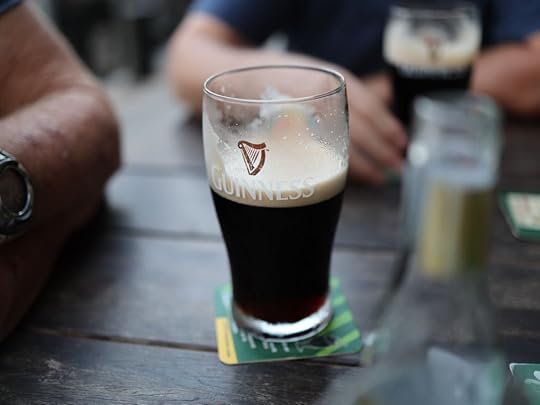 glass of Guinness stout beer on a table