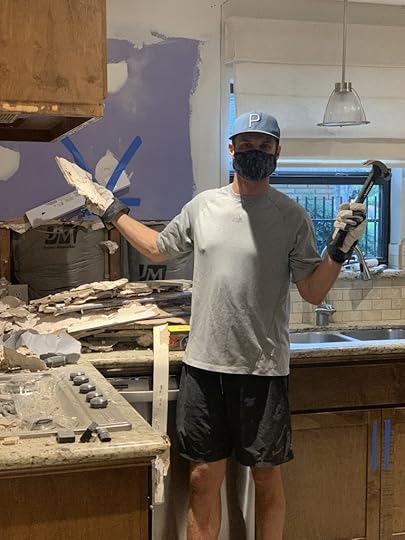 Man doing DIY demolition