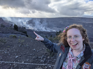 The Princess Blogger pointing to an active volcano