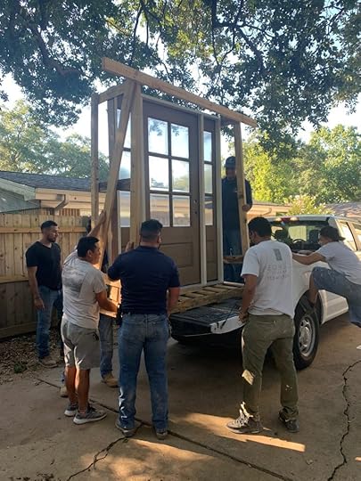Crew delivering exterior door