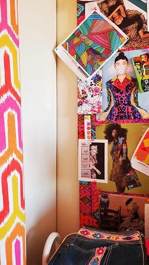 mood board with art, fashion magazine clippings, and fabric swatches