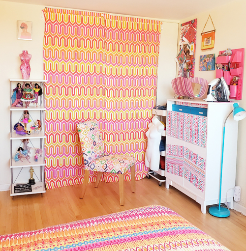 bright, bohemian chic bedroom with custom curtains replacing closet doors
