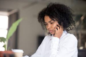 Person talking on the phone in an office