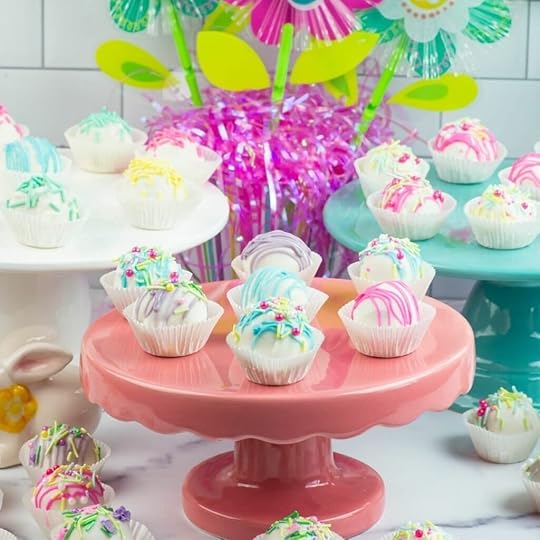 Easter Cake Balls on colorful cakes stands.