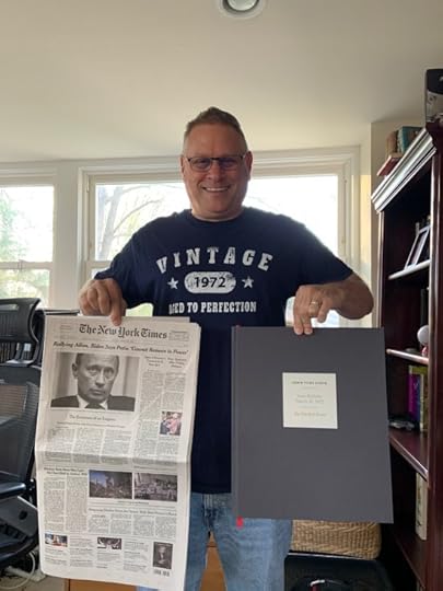 Me, completing my 50 years of NY Times front pages with the front page of the paper from March 27, 2022.